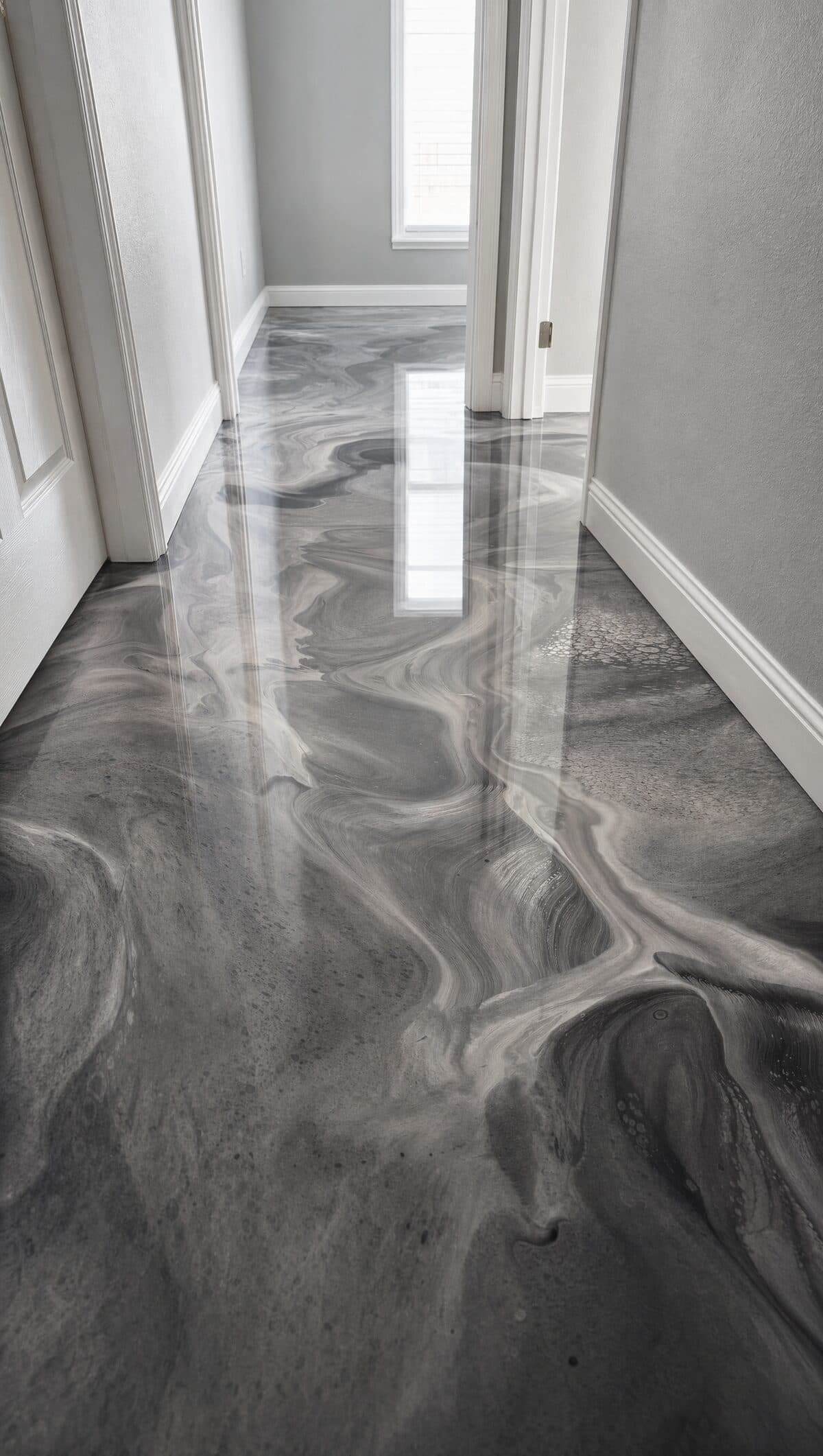 Metallic epoxy hallway floor showing depth and natural light reflection in a Las Vegas residential install by ProShield Epoxy