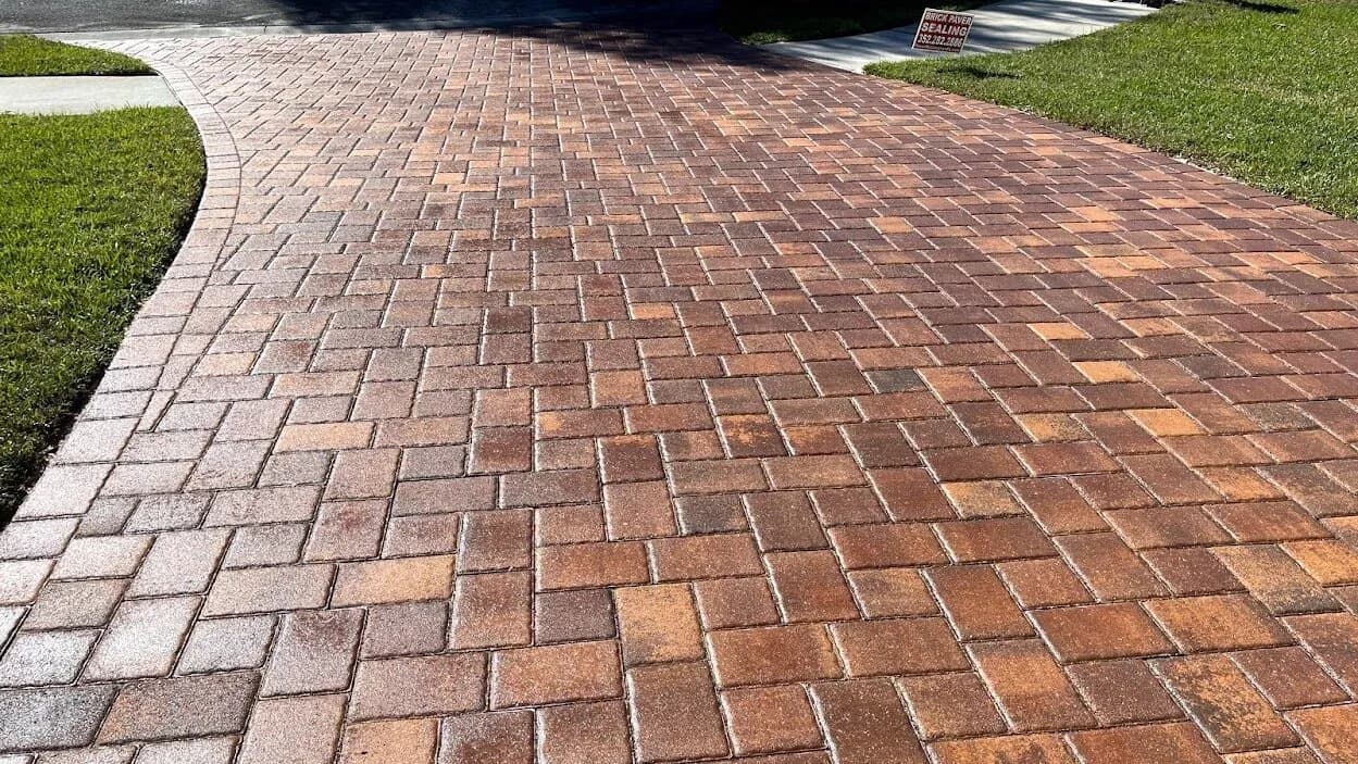 Glossy wet-look sealed brick paver driveway