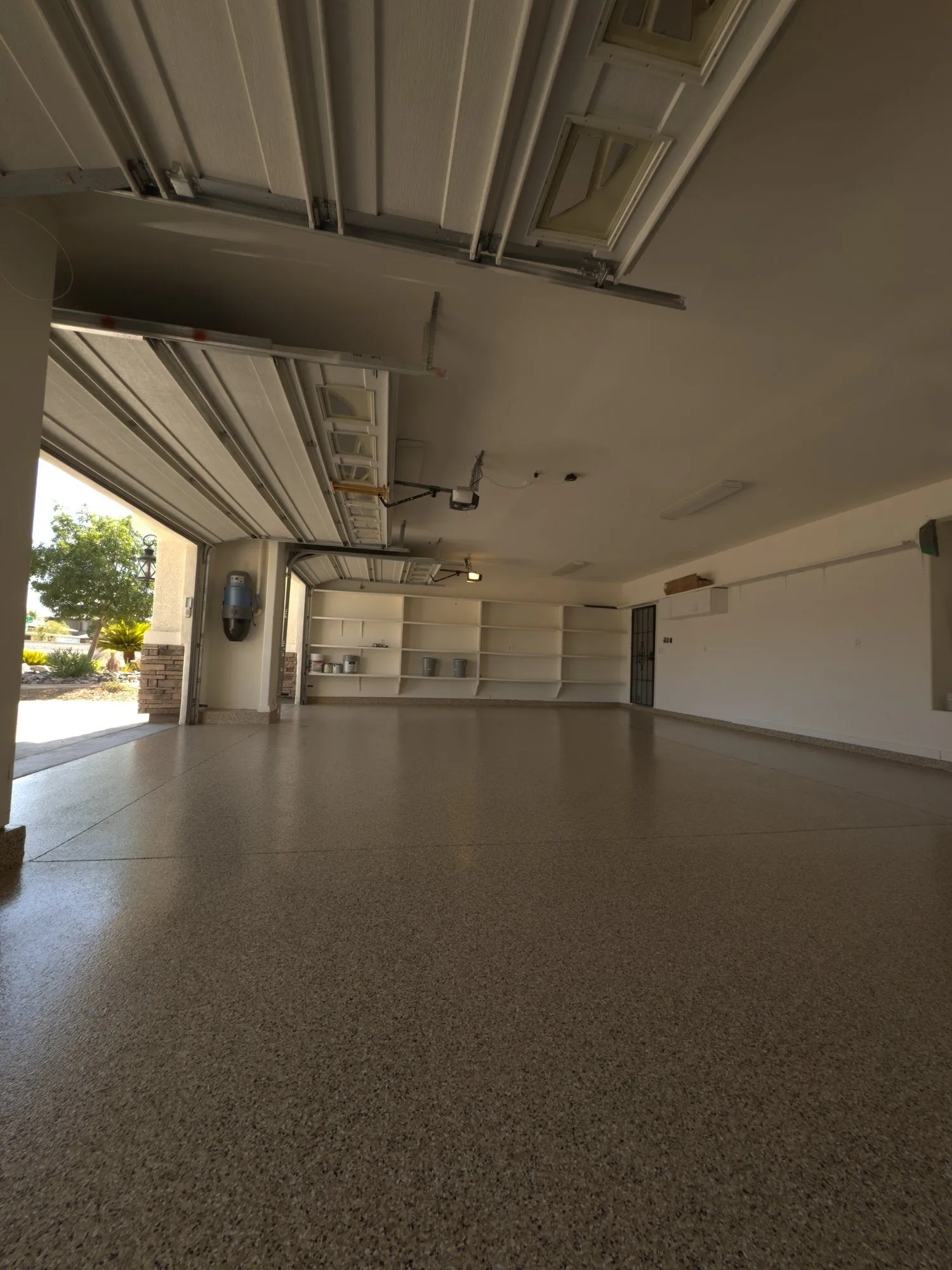 ProFlake garage with open door and shelving