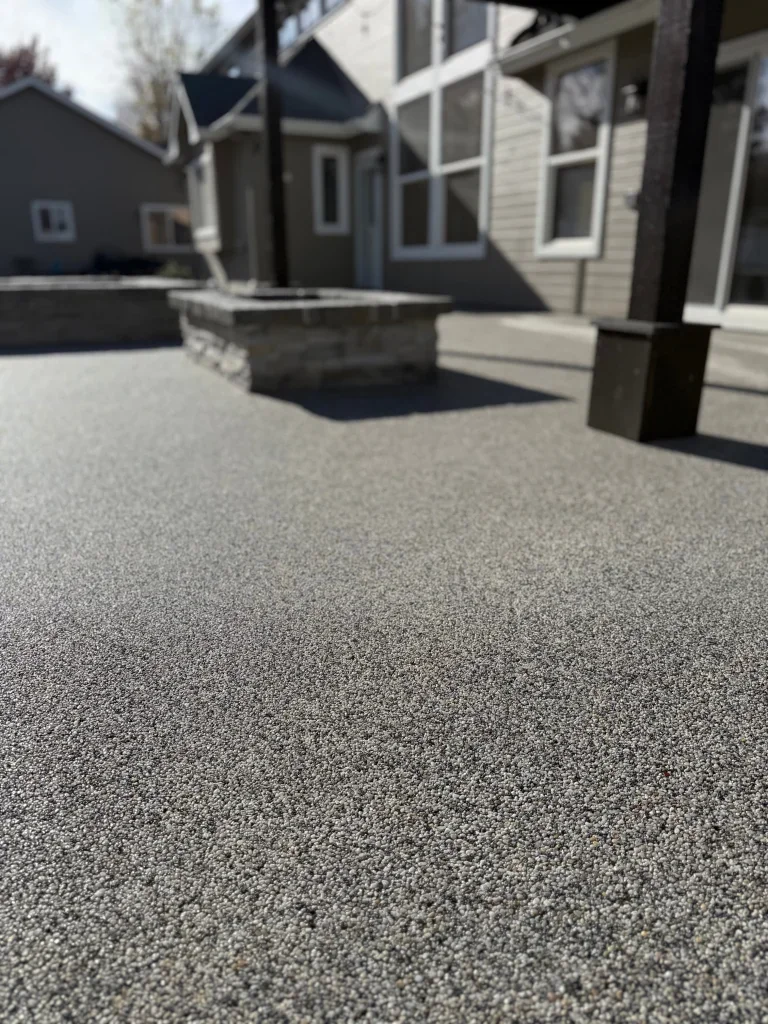 VubaStone resin-bound patio surrounding a fire pit area